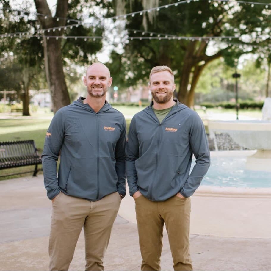 Panther Pest Control owners at a Winter Park fountain