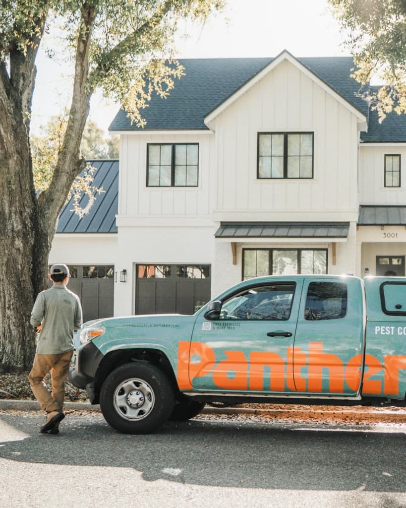 Panther Pest Control service truck parked outside an Orlando property