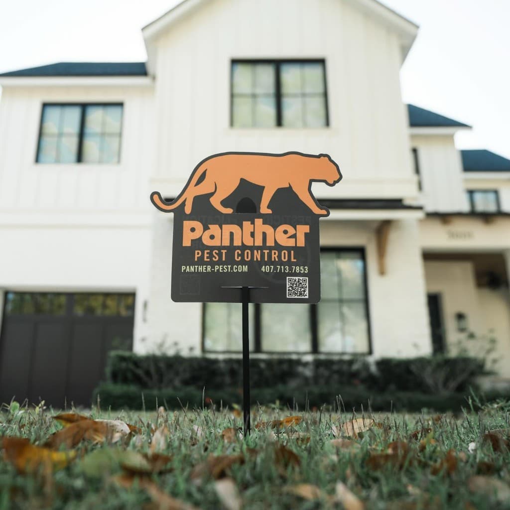 Panther Pest Control yard sign in front of a protected Orlando home