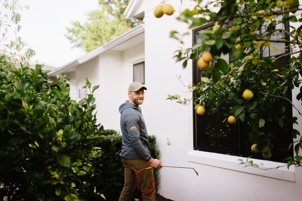 Panther Pest Control technician arriving to service an Orlando home